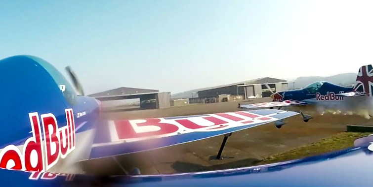 red-bull-barnstorming-side-by-side-fly-through-hangar-no